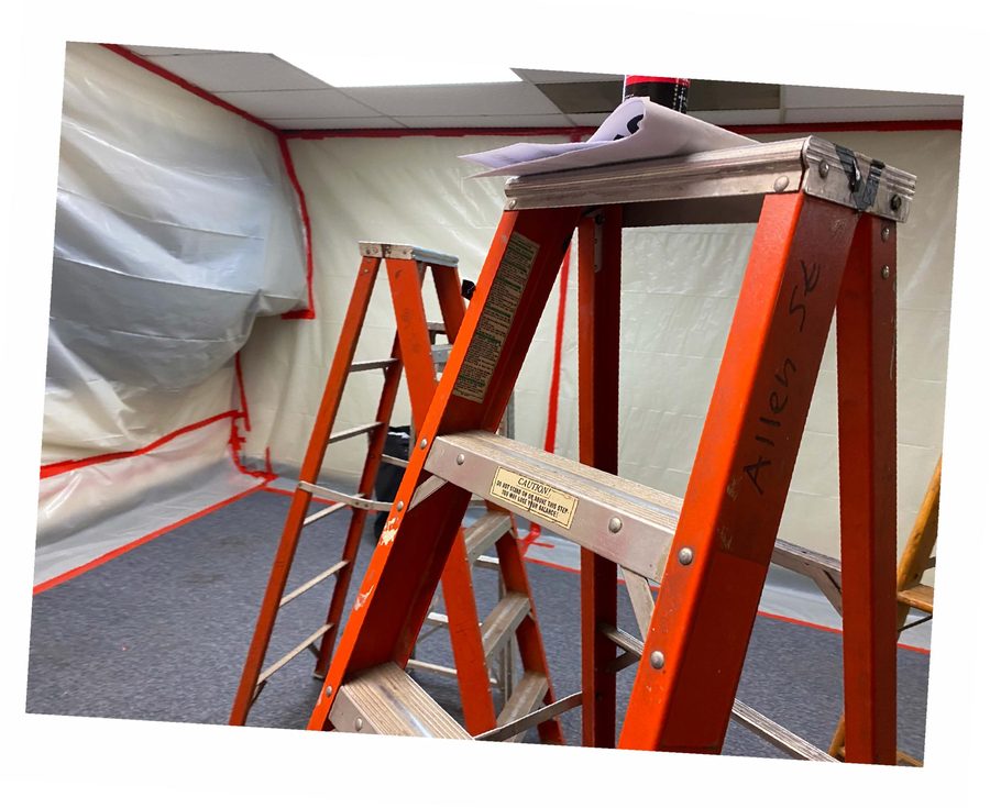 Full containment barriers taped and in place.