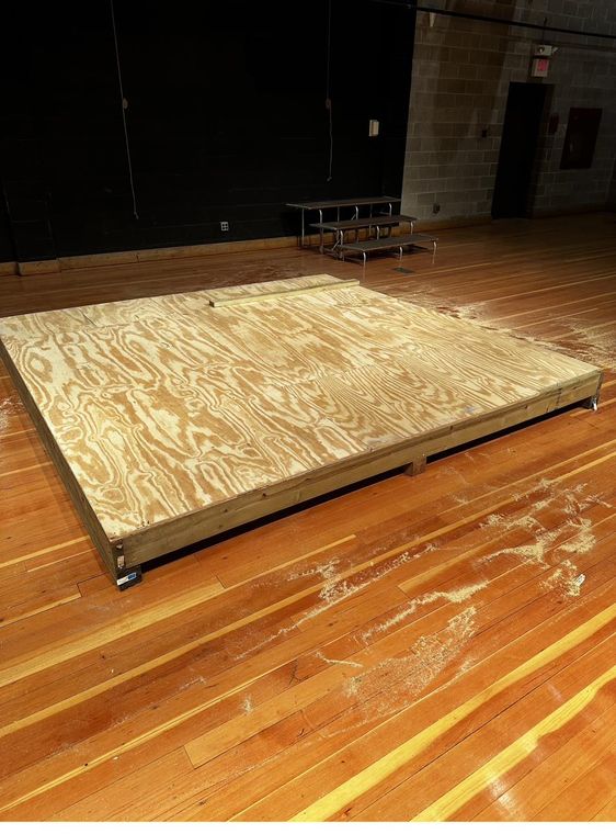 Framing and decking the shed floors on the AC3 gym floor.