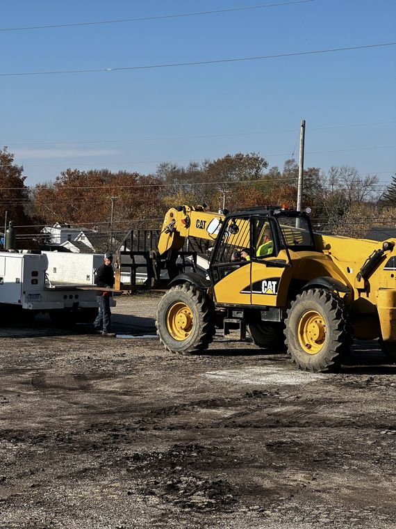 Loading finished panels with the CAT telehandler in the AC3 yard.