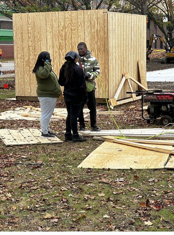 Raising the walls on site.